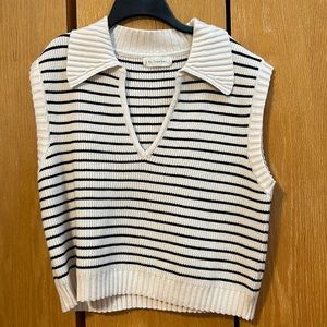 Cream and black oversized sweater vest with collar, size small.